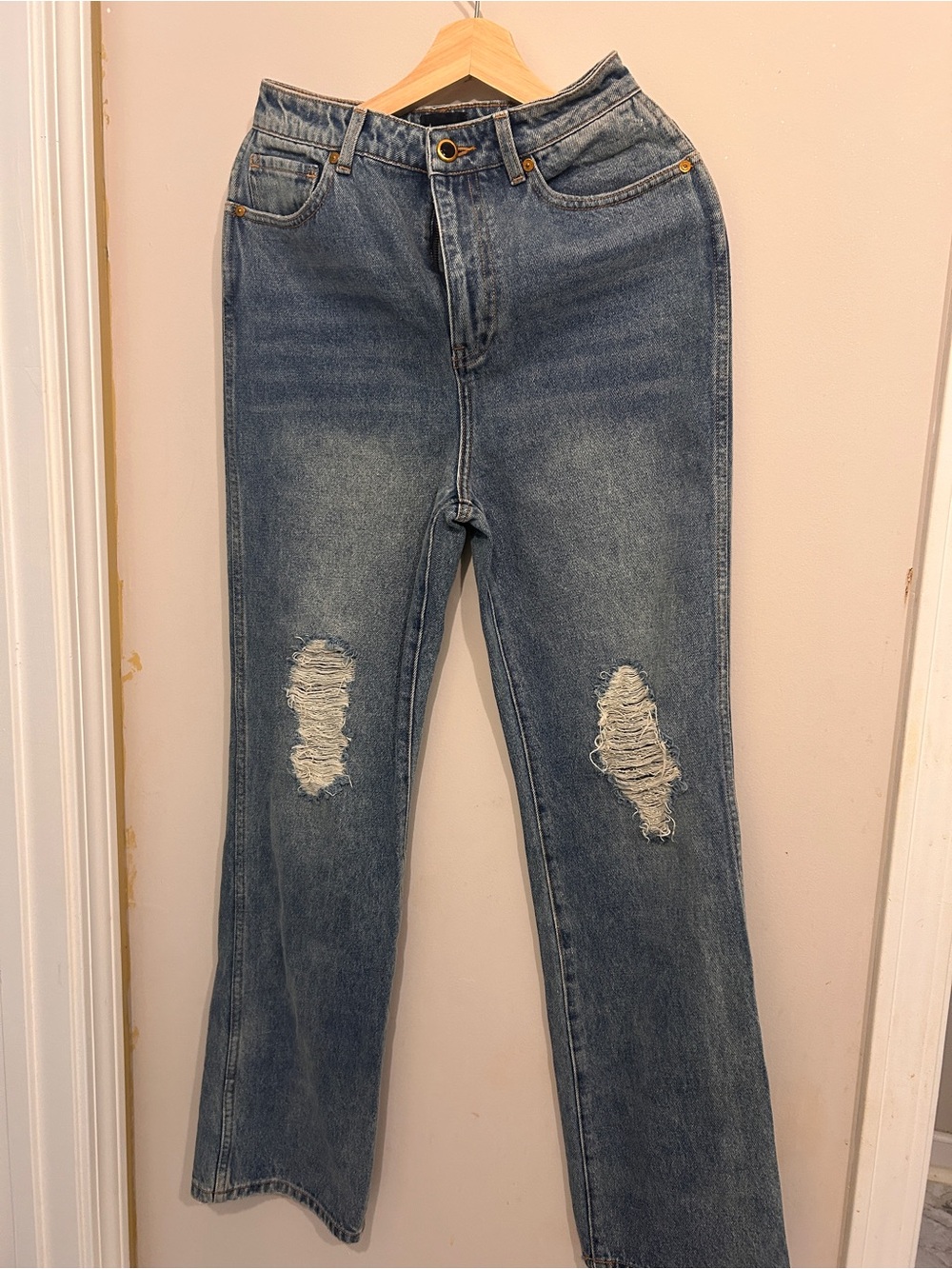 KHAITE Distressed Mid-Blue Flare Jeans
